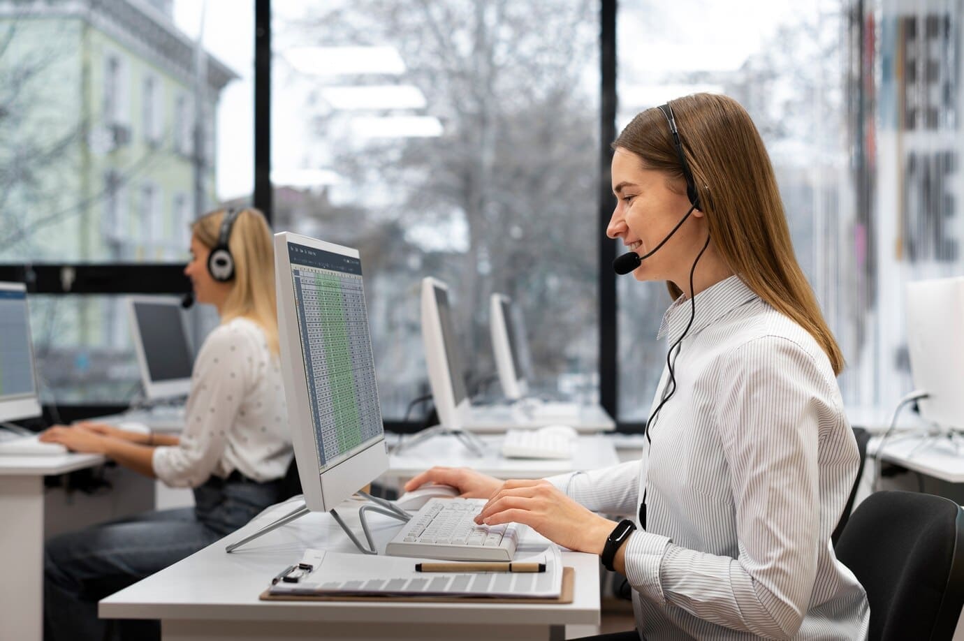 colleagues-working-together-call-center-office_23-2149256064 Following Up Promptly and Consistently