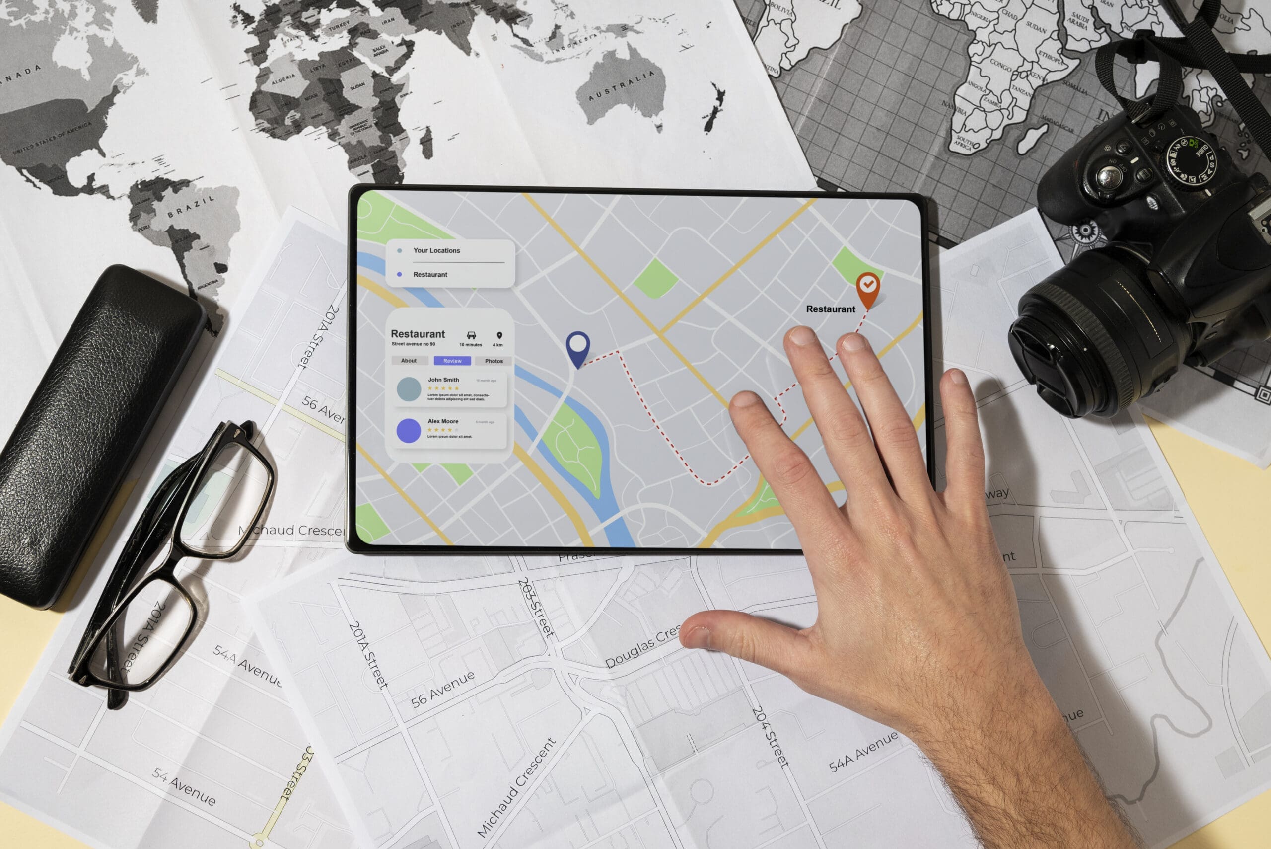 top-view-gps-tablet-with-hand-world-map Optimize Your Website & Local SEO for Luxury Leads